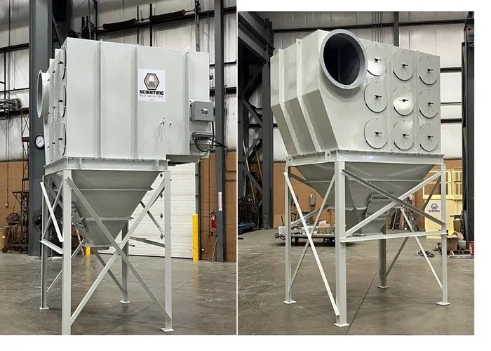 Two grey Scientific HSL cartridge dust collectors on steel support legs against a plain shop wall.